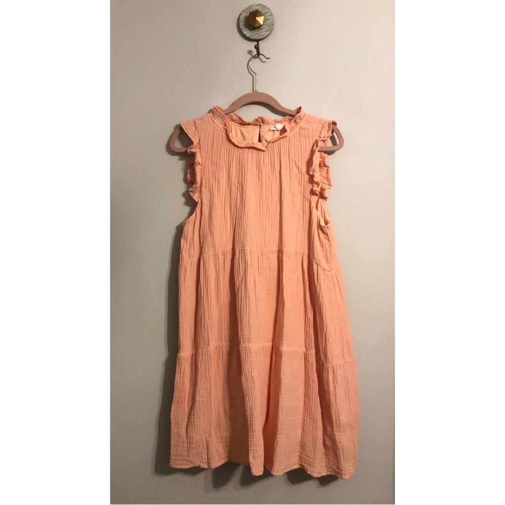 Gauzy coral/peach dress.
